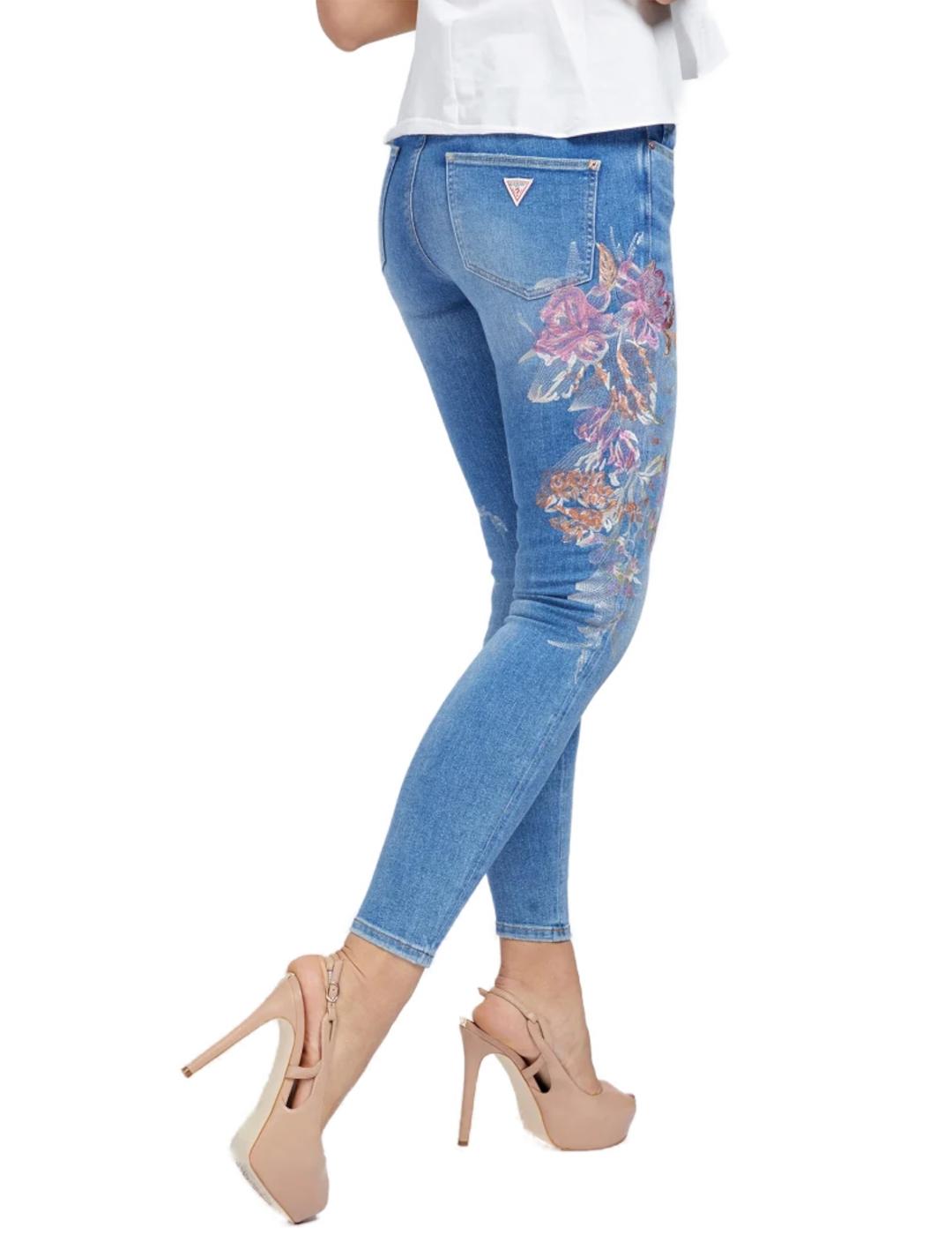 Pantalón vaquero Guess bordados rosas de mujer