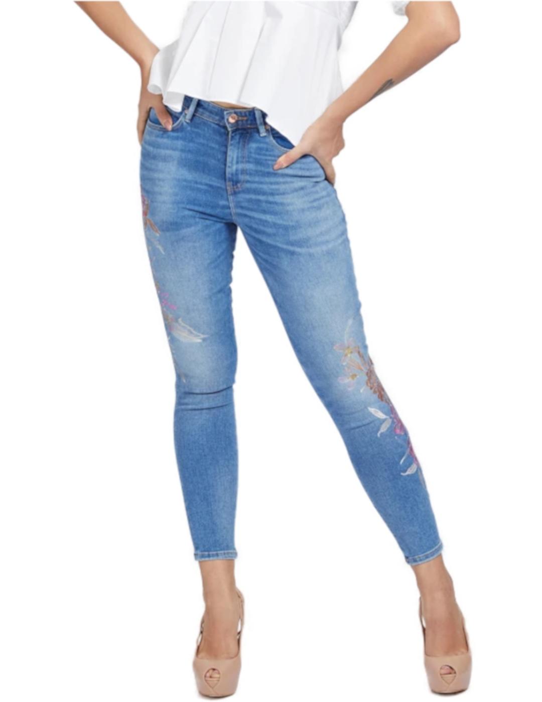 Pantalón vaquero Guess bordados rosas de mujer