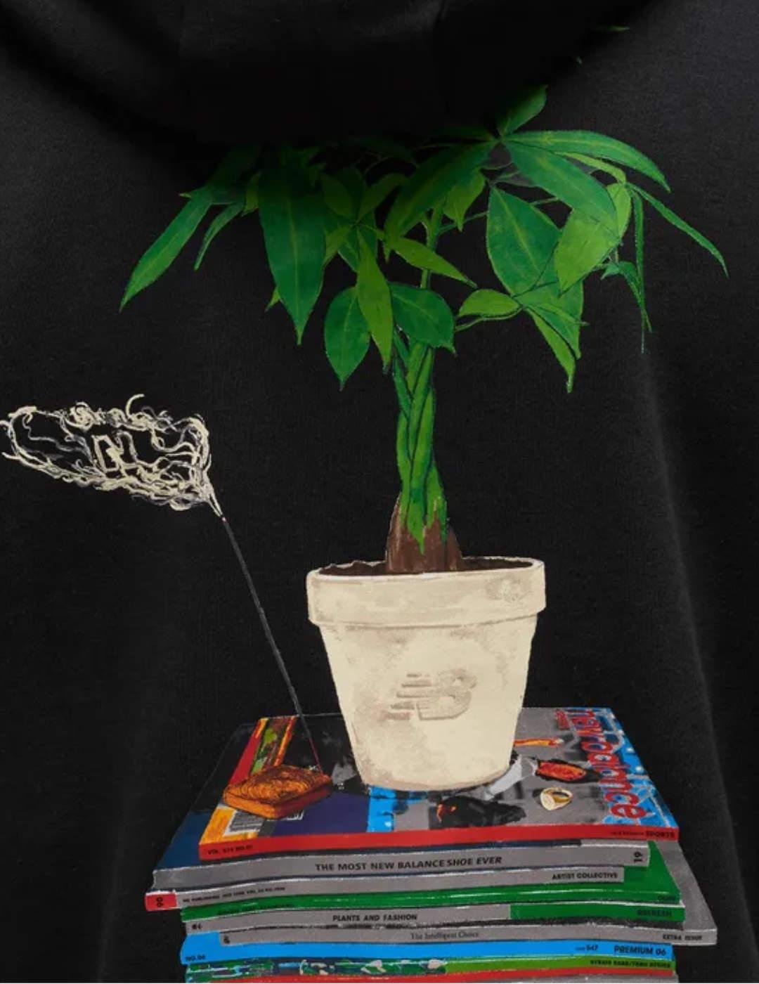 Sudadera New Balance negra con capucha de hombre